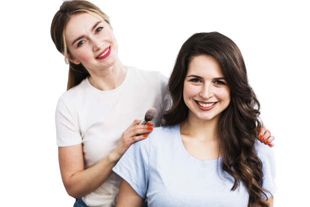 female visagiste with client smiling camera